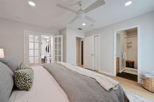 2607 Coatbridge Dr, Austin, TX 78745 - bedroom featuring french doors, wood finished floors, recessed lighting, ceiling fan, and a closet