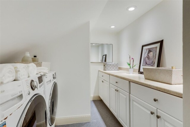 1607 Pease Rd, Austin, TX 78703 - laundry room with washer and clothes dryer, cabinet space, baseboards, and recessed lighting