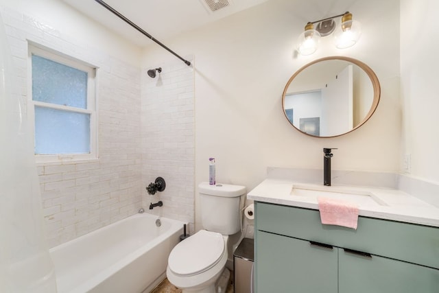 239 Brahan Blvd, San Antonio, TX 78215 - bathroom featuring vanity, washtub / shower combination, and toilet