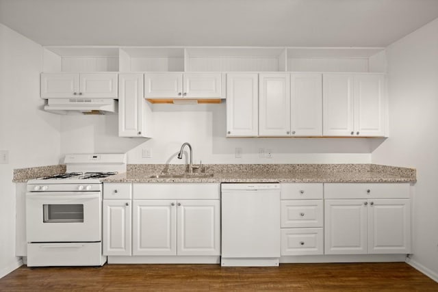 620 S 1st St Unit 209, Austin, TX 78704 - kitchen with white appliances, under cabinet range hood, white cabinetry, and dark wood-style floors