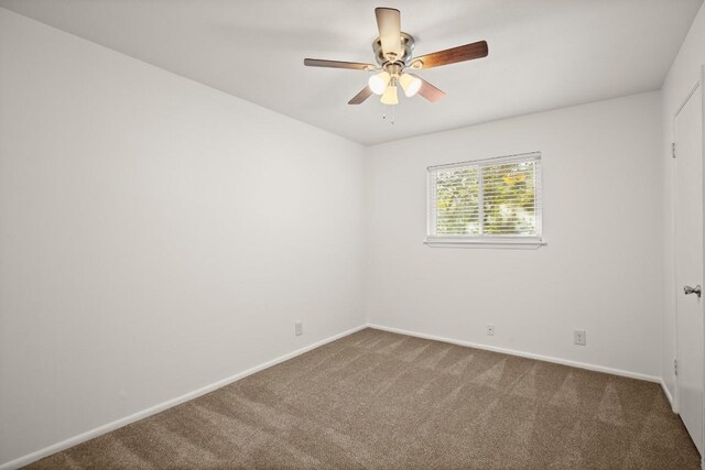620 S 1st St Unit 209, Austin, TX 78704 - empty room featuring carpet flooring and a ceiling fan