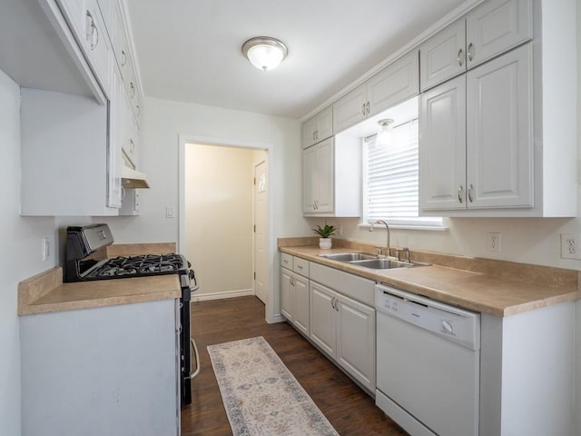 kitchen with a sink, stainless steel gas range, dark wood finished floors, white dishwasher, and white cabinets