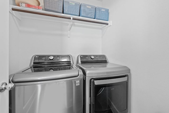 5911 Rubicon Run, Austin, TX 78745 - laundry room with washing machine and dryer