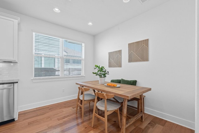 5911 Rubicon Run, Austin, TX 78745 - dining room with baseboards, light wood finished floors, and recessed lighting