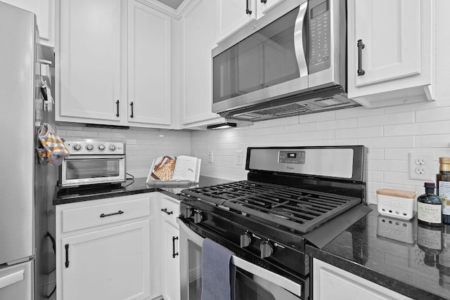5911 Rubicon Run, Austin, TX 78745 - kitchen featuring appliances with stainless steel finishes, tasteful backsplash, and white cabinetry