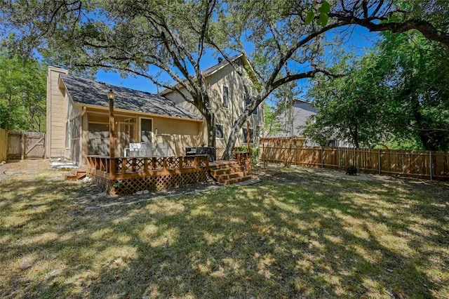 13109 New Boston Bnd, Austin, TX 78729 - fenced backyard featuring a wooden deck