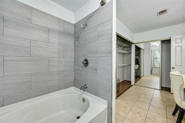 13109 New Boston Bnd, Austin, TX 78729 - bathroom featuring tile patterned floors and bathtub / shower combination