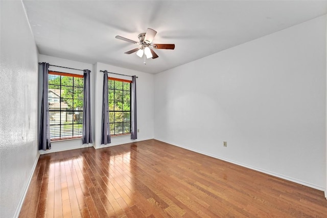13109 New Boston Bnd, Austin, TX 78729 - empty room with wood-type flooring, baseboards, and ceiling fan