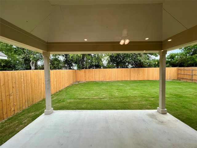18204 Willow Sage Ln, Elgin, TX 78621 - fenced backyard with a patio