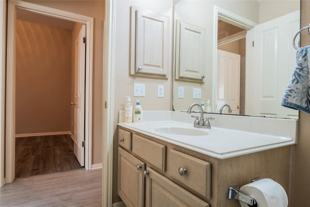 9120 Fainwood Ln, Austin, TX 78749 - bathroom with vanity and wood finished floors