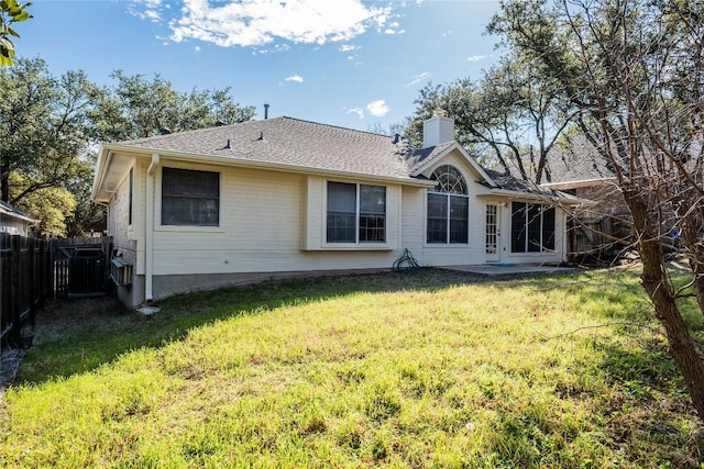 9120 Fainwood Ln, Austin, TX 78749 - back of house with a chimney