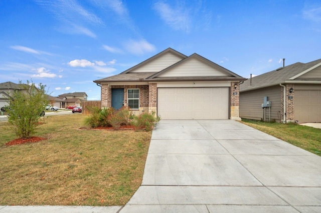 ranch-style house featuring brick siding, a garage, concrete driveway, and a front yard