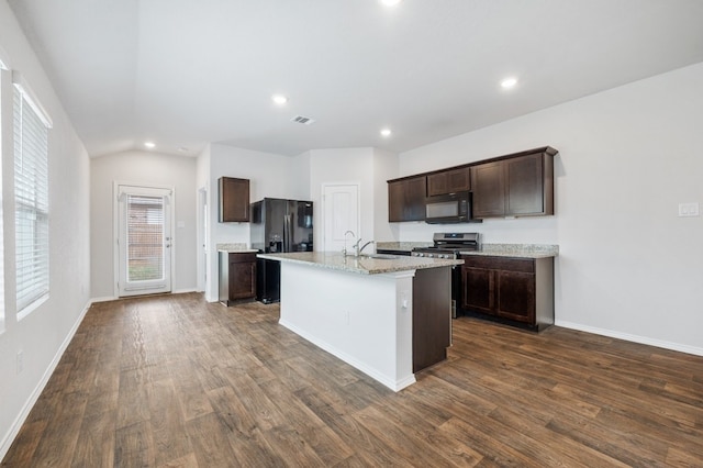 kitchen with dark brown cabinetry, visible vents, black appliances, and dark wood-style flooring
