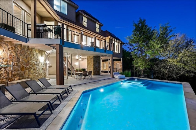 3416 Tarlton Ln, Austin, TX 78746 - pool at twilight with stairs and a patio