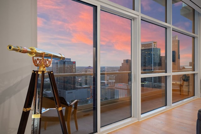 555 E 5th St Unit 2906, Austin, TX 78701 - entryway with a view of city, wood finished floors, and a wall of windows
