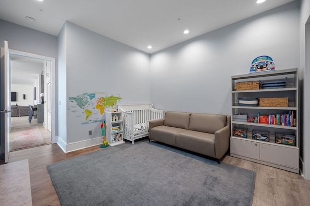 555 E 5th St Unit 2906, Austin, TX 78701 - sitting room featuring wood finished floors and recessed lighting
