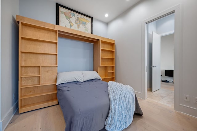 555 E 5th St Unit 2906, Austin, TX 78701 - bedroom with light wood finished floors and recessed lighting