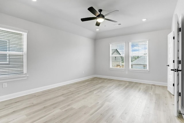 spare room with light wood-style floors, ceiling fan, baseboards, visible vents, and recessed lighting