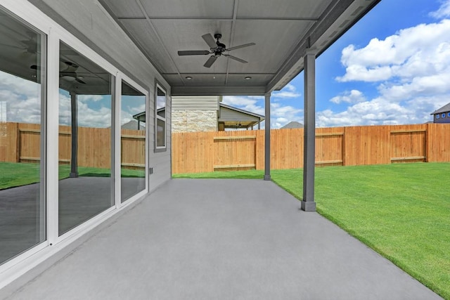 view of patio with a fenced backyard and ceiling fan