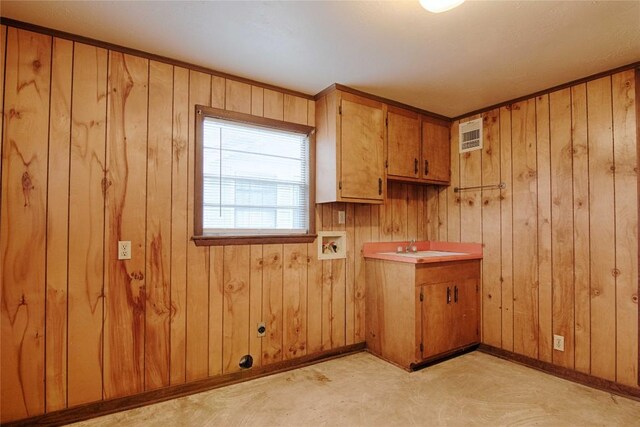 1116-C Simpson St, Schulenburg, TX 78956 - kitchen featuring baseboards and wooden walls