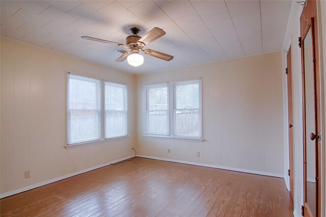 1116-C Simpson St, Schulenburg, TX 78956 - empty room with a ceiling fan, baseboards, and wood finished floors
