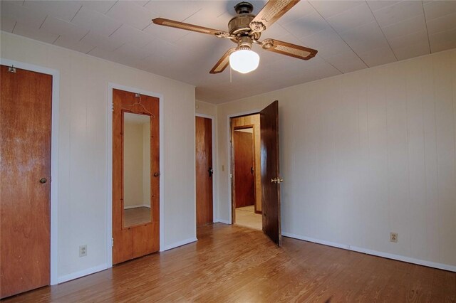 1116-C Simpson St, Schulenburg, TX 78956 - unfurnished bedroom featuring baseboards and light wood-style floors