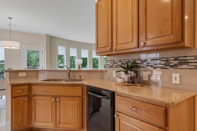 6520 Walebridge Ln, Austin, TX 78739 - kitchen featuring dishwasher, a peninsula, tasteful backsplash, light stone counters, and pendant lighting