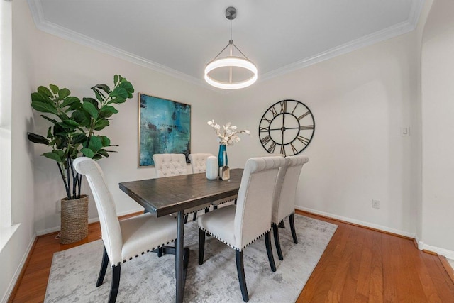 6520 Walebridge Ln, Austin, TX 78739 - dining space with wood finished floors and crown molding