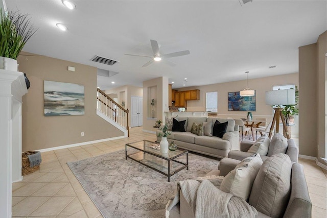 6520 Walebridge Ln, Austin, TX 78739 - living area with stairway, light tile patterned floors, and a ceiling fan