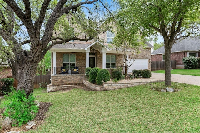 6520 Walebridge Ln, Austin, TX 78739 - view of front facade with driveway, a porch, brick siding, and a garage