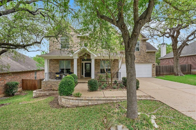6520 Walebridge Ln, Austin, TX 78739 - traditional home with covered porch, driveway, brick siding, and a garage