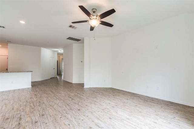 1713 Pahmeyer Path, New Braunfels, TX 78130 - unfurnished living room featuring light wood-style floors, a ceiling fan, and recessed lighting