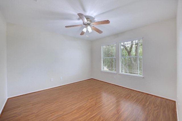 1012 Peyton Pl, Cedar Park, TX 78613 - unfurnished room featuring wood finished floors and a ceiling fan
