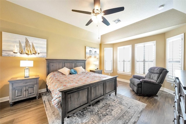 598 Jacksdaw Dr, Austin, TX 78737 - bedroom with baseboards, wood finished floors, and a ceiling fan