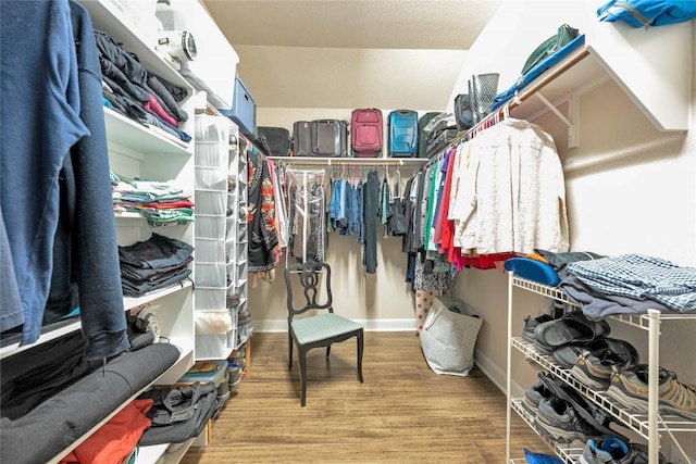 598 Jacksdaw Dr, Austin, TX 78737 - walk in closet featuring wood finished floors