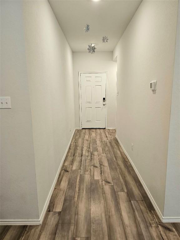 1124 Velvet Ct, Troy, TX 76579 - hallway with wood finished floors
