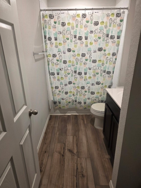1124 Velvet Ct, Troy, TX 76579 - full bathroom with vanity, wood finished floors, and shower / bathtub combination with curtain
