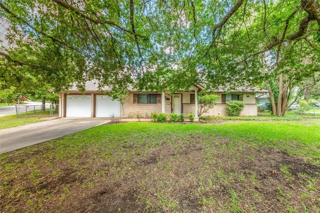 2004 Teakwood Dr, Austin, TX 78757 - view of front of house featuring concrete driveway, an attached garage, and brick siding