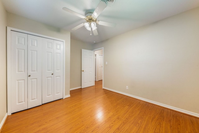 2004 Teakwood Dr, Austin, TX 78757 - unfurnished bedroom featuring light wood-type flooring, a closet, and a ceiling fan
