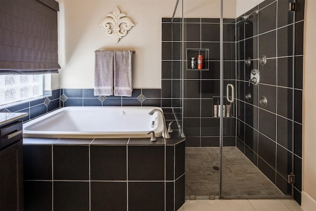 11913 Natures Bnd, Austin, TX 78753 - full bath with a bath, a shower stall, vanity, and tile patterned flooring