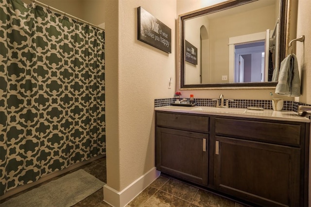11913 Natures Bnd, Austin, TX 78753 - bathroom with double vanity, tile patterned floors, and curtained shower