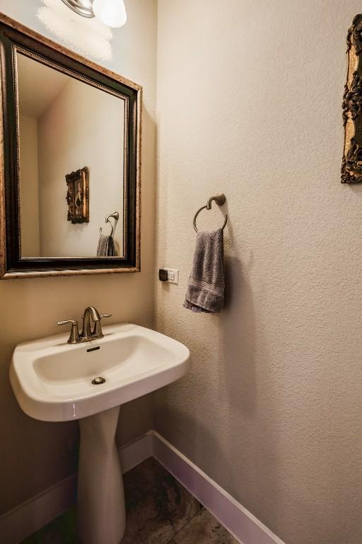 11913 Natures Bnd, Austin, TX 78753 - bathroom with baseboards and tile patterned flooring
