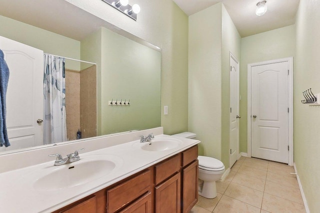 1411 Rowan Dr, Georgetown, TX 78628 - full bath featuring double vanity, a shower with curtain, and tile patterned floors