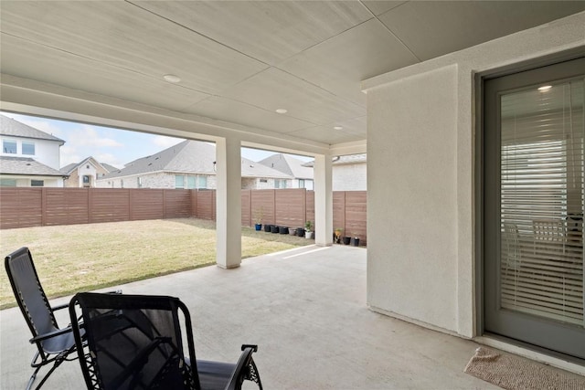 708 Leeward Pass, Leander, TX 78641 - fenced backyard with a patio area