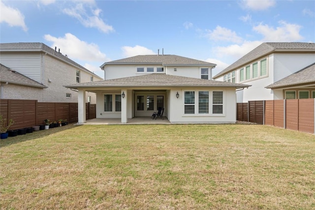 708 Leeward Pass, Leander, TX 78641 - back of house with a patio, a fenced backyard, and stucco siding