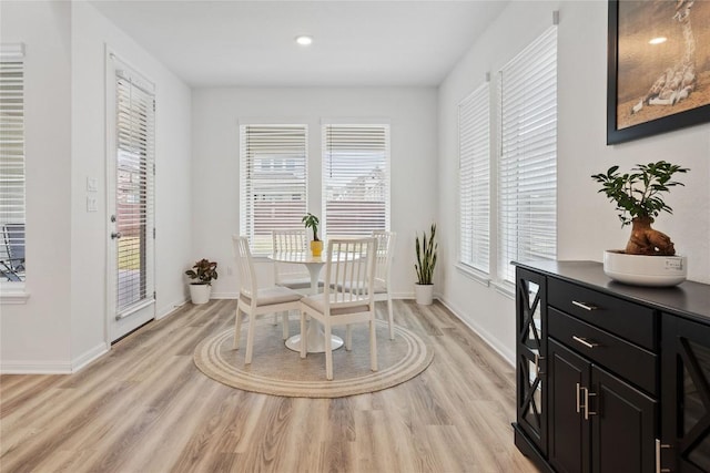 708 Leeward Pass, Leander, TX 78641 - dining space with light wood finished floors and recessed lighting