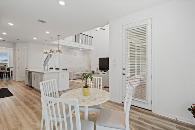 708 Leeward Pass, Leander, TX 78641 - dining room featuring light wood finished floors, recessed lighting, and ceiling fan