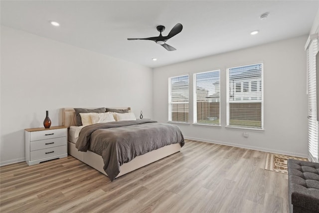708 Leeward Pass, Leander, TX 78641 - bedroom featuring light wood-type flooring, a ceiling fan, and recessed lighting