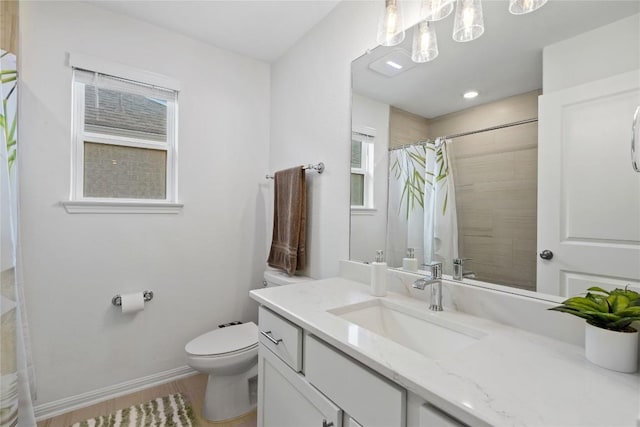 708 Leeward Pass, Leander, TX 78641 - bathroom with vanity, tiled shower, and wood finished floors