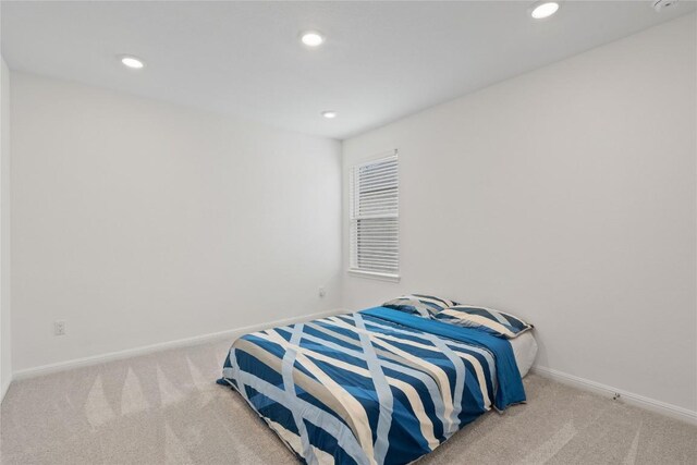 708 Leeward Pass, Leander, TX 78641 - carpeted bedroom with recessed lighting